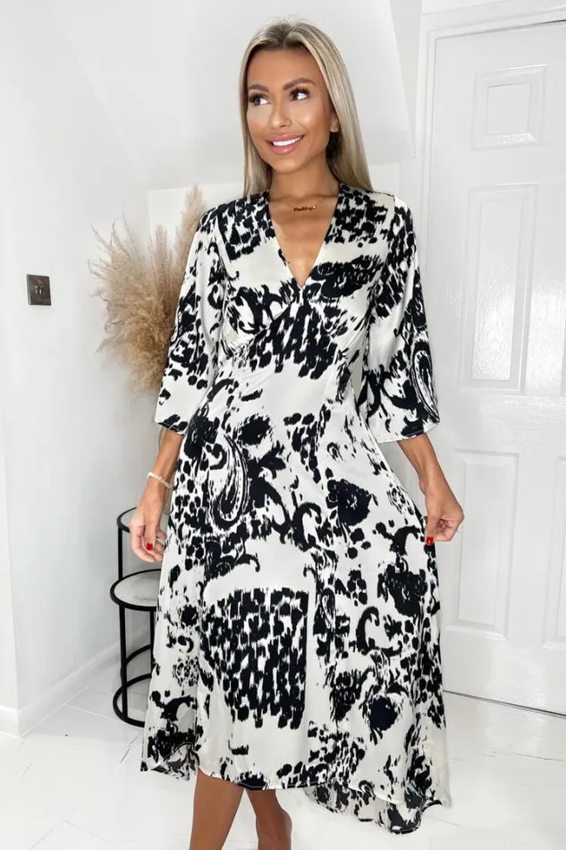 AX Paris Dresses Black And Cream Printed V Neck Bell Sleeve Midi Dress