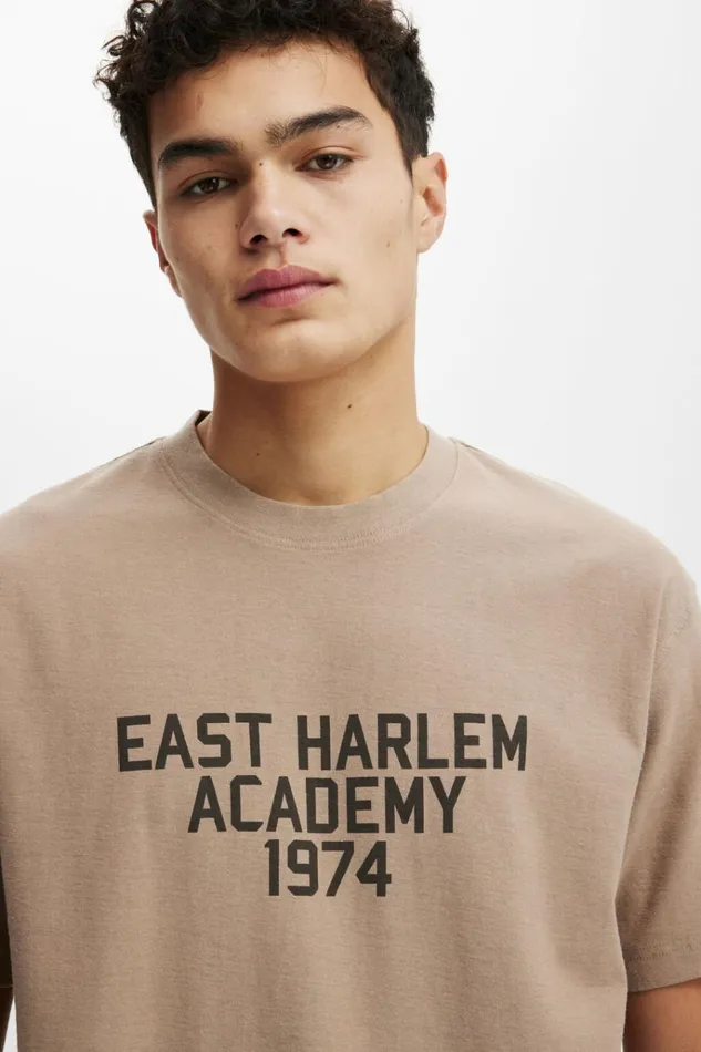 Men Tees and Tanks Cotton On Loose Fit College TShirt Taupeeast Harlem 1974 Men Tees and Tanks Cotton On Loose Fit College TShirt Taupeeast Harlem 1974