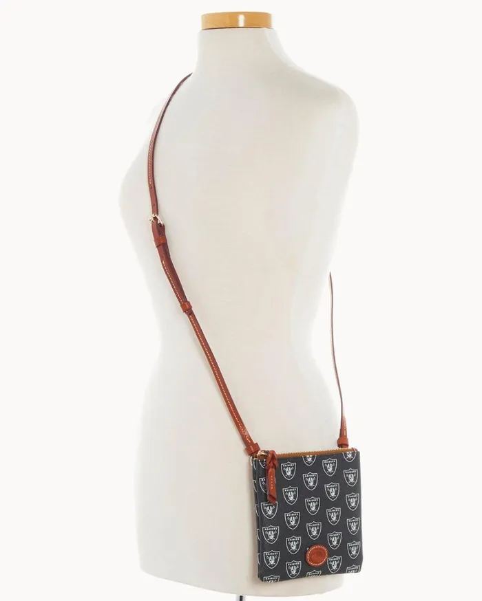 NFL Raiders Small North South Top Zip Crossbody Raiders Women Dooney and Bourke Crossbodies NFL Raiders Small North South Top Zip Crossbody Raiders Women Dooney and Bourke Crossbodies